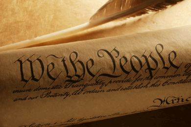 Image shows the first words of the U.S. Constitution  We the People